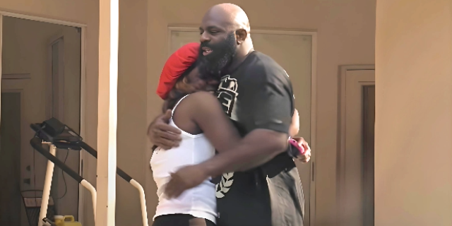 Kimbo Slice and his daughter Kevina hugging each other, reflecting father daughter bond