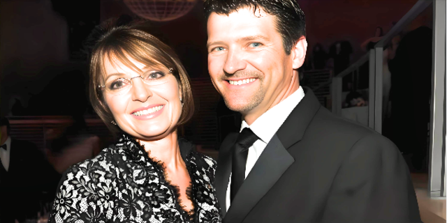 Todd Palin and Sarah Heath, smiling beautifuly and wearing black dresses